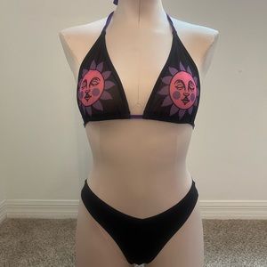 Sun top and black bottoms